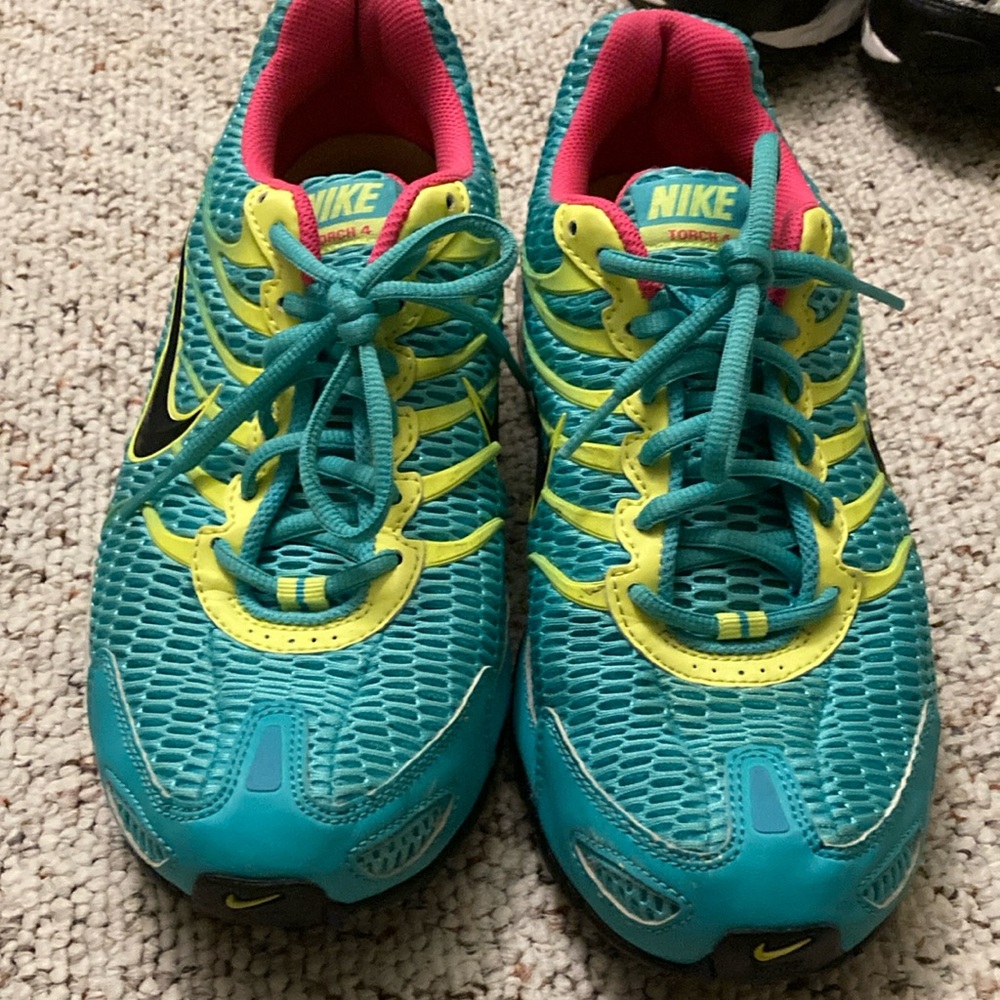 LIKE NEW….Nike Torch 4 Nike Teal and Yellow Running Shoes